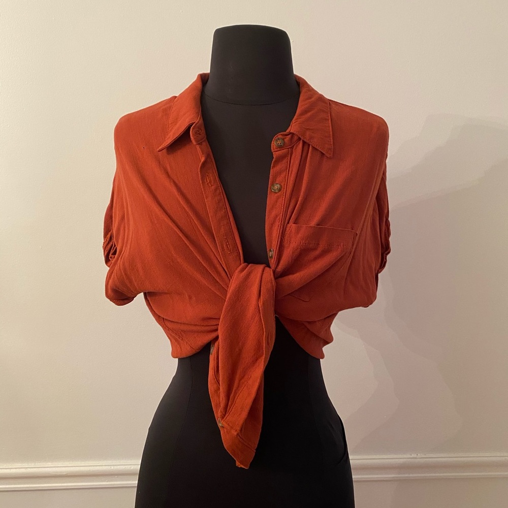 Copper button down short sleeve blouse.
